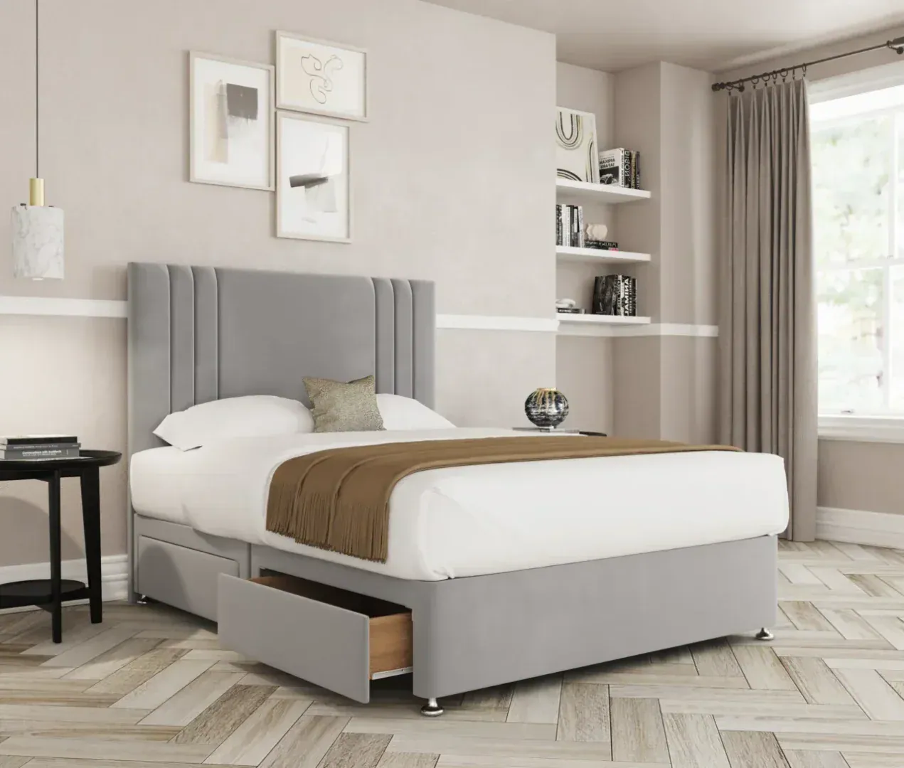 A divan bed positioned in a furnished bedroom